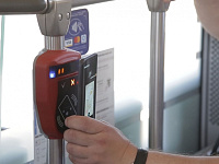 Проведение оплаты проезда в пути следования поезда с использованием мобильного телефона с технологией NFC