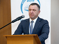 С докладом выступает генеральный директор государственного предприятия «БТЛЦ» Андрей Николаевич Сладкевич